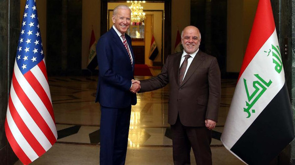 A handout picture released by the Iraqi Prime Minister Haider al-Abadi's office on April 28, 2016 shows him (R) shaking hands with US Vice President Joe Biden following a meeting in Baghdad.
Biden arrived in Baghdad for an unannounced visit to Iraq, whose leadership is bogged down in a protracted political crisis even as its forces battle jihadists. "The vice president has arrived in Iraq for meetings with (the) Iraqi leadership focused on encouraging Iraqi national unity and continued momentum in the fight against ISIL," a statement from Biden's office said, using an acronym for the Islamic State jihadist group. / AFP PHOTO / IRAQI PRIME MINISTER'S OFFICE / Handout / === RESTRICTED TO EDITORIAL USE - MANDATORY CREDIT "AFP PHOTO / HO / IRAQI PRIME MINISTER'S OFFICE " - NO MARKETING NO ADVERTISING CAMPAIGNS - DISTRIBUTED AS A SERVICE TO CLIENTS ===