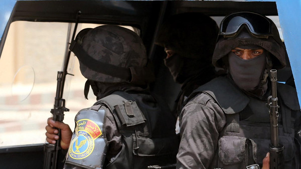 Members of the police special forces guard the funeral service of Egyptian-American Ahmed Zewail world's Nobel Prize in chemistry, who died last Tuesday at the age of 70 in the United States at his family's tomb in 6th of October City, outskirt of Cairo, Egypt, August 7, 2016. REUTERS/Mohamed Abd El Ghany