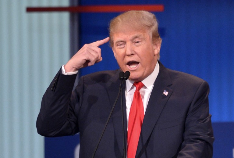 Republican presidential hopeful Donald Trump speaks during the prime time Republican presidential primary debate on August 6, 2015 at the Quicken Loans Arena in Cleveland, Ohio. AFP PHOTO/MANDEL NGAN