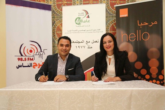توقيع اتفاقية شراكة استراتيجية بين “Orange” الأردن وإذاعة “فرح الناس”