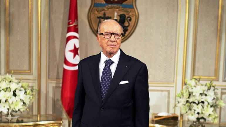 epa05189221 Tunisian President Beji Caid Essebsi looks on before his meeting with German Interior Minister Thomas de Maiziere (not pictured) at Carthage Palace in Tunis, Tunisia, 01 March 2016. The German Interior Minister is visiting Tunisia as part of a three-day tour that took him to Morocco and Algeria. EPA/MOHAMED MESSARA