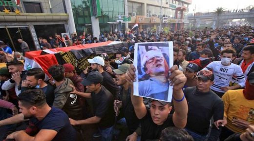 Iraqi demonstrators carry the coffin of a fellow protestor who was killed during an anti-government protest the previous day, on November 27, 2019 in the central city of Karbala. - Iraqi anti-government protesters blocked roads with burning tyres in the country's south, as schools and public offices stayed shut a day after deadly clashes with security forces, as part of the biggest wave of protests since 2003, leaving more than 350 people dead and around 15,000 wounded since early October. (Photo by Mohammed SAWAF / AFP) (Photo by MOHAMMED SAWAF/AFP via Getty Images)