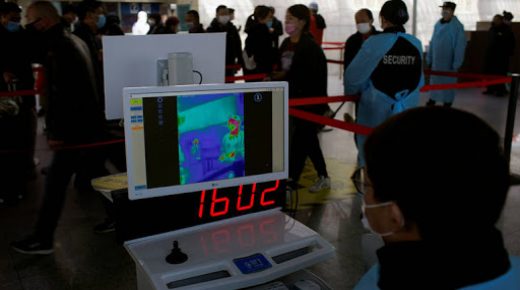 Passengers wearing masks are seen on a thermal screen at the Shanghai railway station in Shanghai, China, as the country is hit by an outbreak of a new coronavirus, February 27, 2020. REUTERS/Aly Song