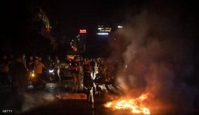 ثان ليلة ساخنة في لبنان.. تحطيم محال وغاز مسيل للدموع
