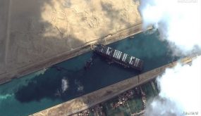 Ever Given container ship is pictured in Suez Canal in this Maxar Technologies satellite image taken on March 26, 2021. Maxar Technologies/Handout via REUTERS ATTENTION EDITORS - THIS IMAGE HAS BEEN SUPPLIED BY A THIRD PARTY. MANDATORY CREDIT. NO RESALES. NO ARCHIVES. DO NOT OBSCURE LOGO. 