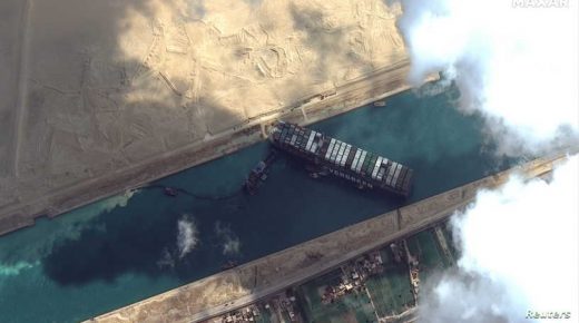 Ever Given container ship is pictured in Suez Canal in this Maxar Technologies satellite image taken on March 26, 2021. Maxar Technologies/Handout via REUTERS ATTENTION EDITORS - THIS IMAGE HAS BEEN SUPPLIED BY A THIRD PARTY. MANDATORY CREDIT. NO RESALES. NO ARCHIVES. DO NOT OBSCURE LOGO. 