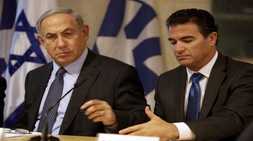 A file picture taken at the Israeli foreign ministry on October 15, 2015, shows Prime Minister Benjamin Netanyahu (L) sitting next to Yossi Cohen, who is currently the head of Israel's National Security Council, and who was named as the 12th head of the Mossad intelligence agency by Netanyahu on December 7, 2015. Cohen will take over from outgoing Mossad head Tamir Pardo, who will be leaving his post after five years next January. AFP PHOTO / GALI TIBBON / AFP / GALI TIBBON (Photo credit should read GALI TIBBON/AFP via Getty Images)