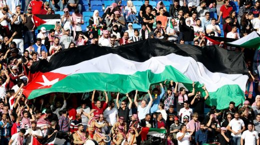 Jordan supporters wave the national flag during the 2019 AFC Asian Cup Round of 16 football match between Jordan and Vietnam at the Al-Maktoum Stadium in Dubai on January 20, 2019. (Photo by Karim Sahib / AFP) (Photo credit should read KARIM SAHIB/AFP via Getty Images)