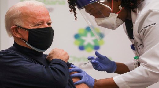 FILE PHOTO: Nurse practitioner Tabe Mase gives U.S. President-elect Joe Biden a dose of a vaccine against the coronavirus disease (COVID-19) at ChristianaCare Christiana Hospital, in Newark, Delaware, U.S. December 21, 2020. REUTERS/Leah Millis/File Photo
