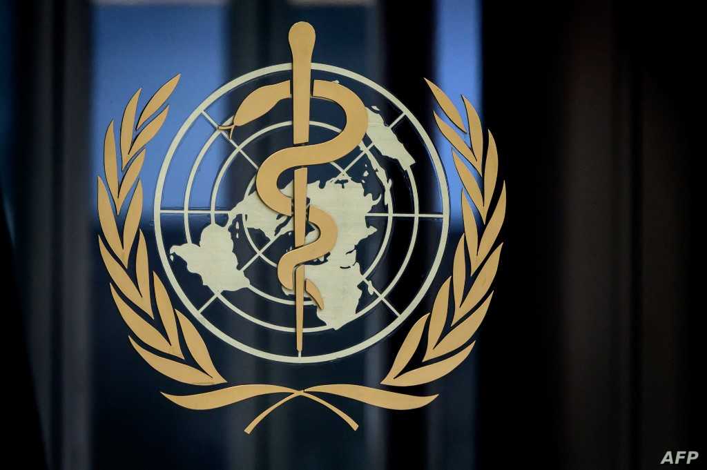 This photograph taken on March 5, 2021 shows a sign of the World Health Organization (WHO) at the entrance of their headquarters in Geneva amid the Covid-19 coronavirus outbreak. (Photo by Fabrice COFFRINI / AFP)