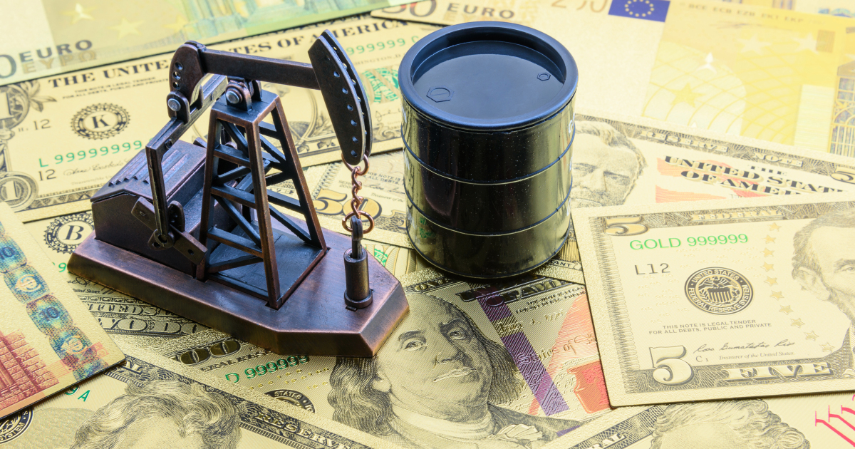 Petroleum, petrodollar and crude oil concept : Pump jack and a black barrel on US USD dollar notes, depicts the money received or earned from sales after investment in the development of oil industry.