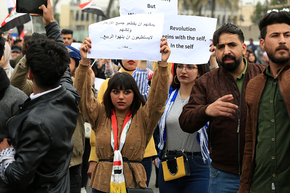 BAGHDAD, IRAQ - FEBRUARY 16: University and high-school students walk towards Tahrir Square to support anti-government protesters in Baghdad, Iraq on February 16, 2020. (Photo by Murtadha Al-Sudani/Anadolu Agency via Getty Images)