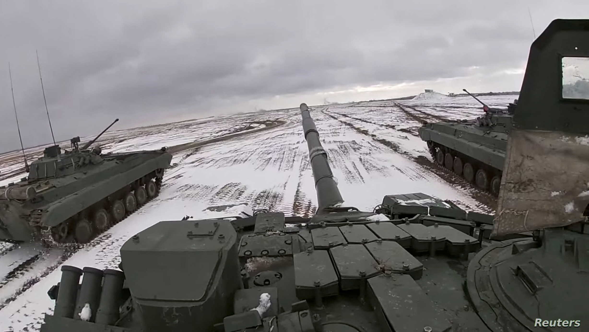 Tanks ride during joint exercises of the armed forces of Russia and Belarus as part of an inspection of the Union State's Response Force, at a firing range in Belarus, in this still image from a handout video released February 2, 2022. Russian Defence Ministry/Handout via REUTERS ATTENTION EDITORS - THIS IMAGE HAS BEEN SUPPLIED BY A THIRD PARTY. MANDATORY CREDIT. NO RESALES. NO ARCHIVES.