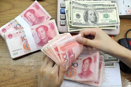 الصين تحدد سعر الدولار مقابل اليوان عند 7.1086